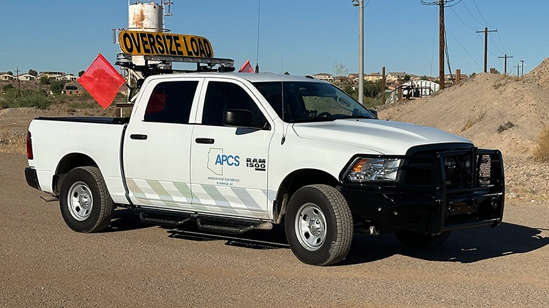 Arizona Pilot Car Service escort vehicle on a Phoenix-area highway